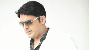 Kapil Sharma के नए कैनेडियन Café ‘Kap’s Café’ पर हुई फायरिंग से मचा बवाल। जानिए पूरी घटना की वजह, पुलिस की कार्रवाई और Kapil Sharma की चुप्पी पर सवाल।